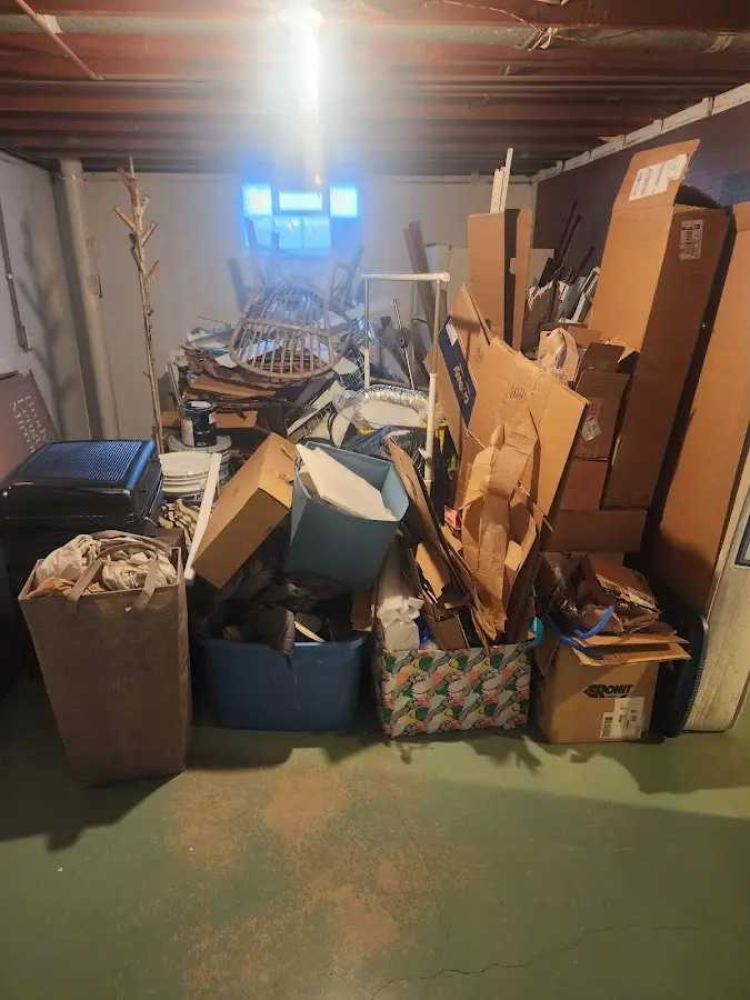 Roll-off dumpster container at job site for Construction Dumpster Rental in Mission Bend